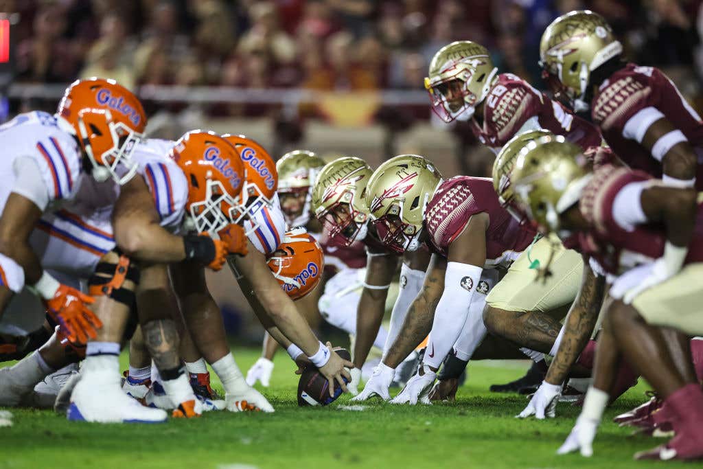 A general view of the line of scrimmage during the first half of a game between the Florida State Seminoles and the Florida Gators.