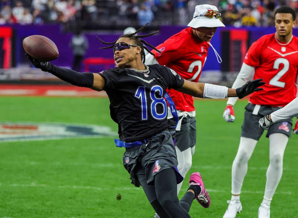 Justin Jefferson #18 of the Minnesota Vikings and NFC carries the ball against the AFC during the 2023 NFL Pro Bowl Games at Allegiant Stadium