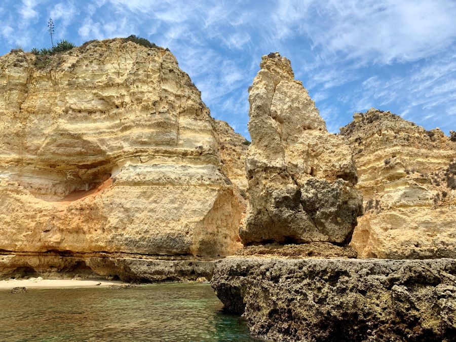 Honeycomb cliffs, dreamy beaches, blue sky and blue water