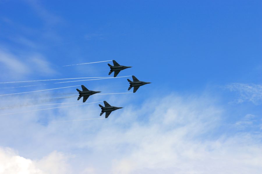 Four jets flying in formation after the Florida International Airshow 